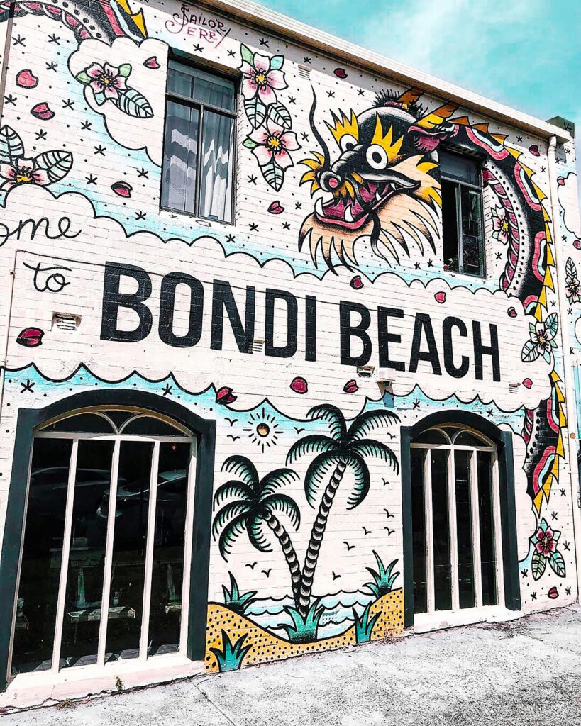 pexels-photo-2236960-2236960 Colorful mural art graces a wall at iconic Bondi Beach in Sydney, showcasing urban creativity.