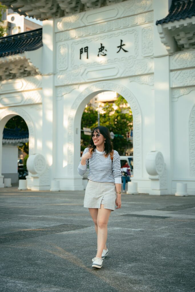 pexels-photo-32222852-32222852 Young woman enjoying a sunny day at Chiang Kai-shek Memorial Hall in Taipei.